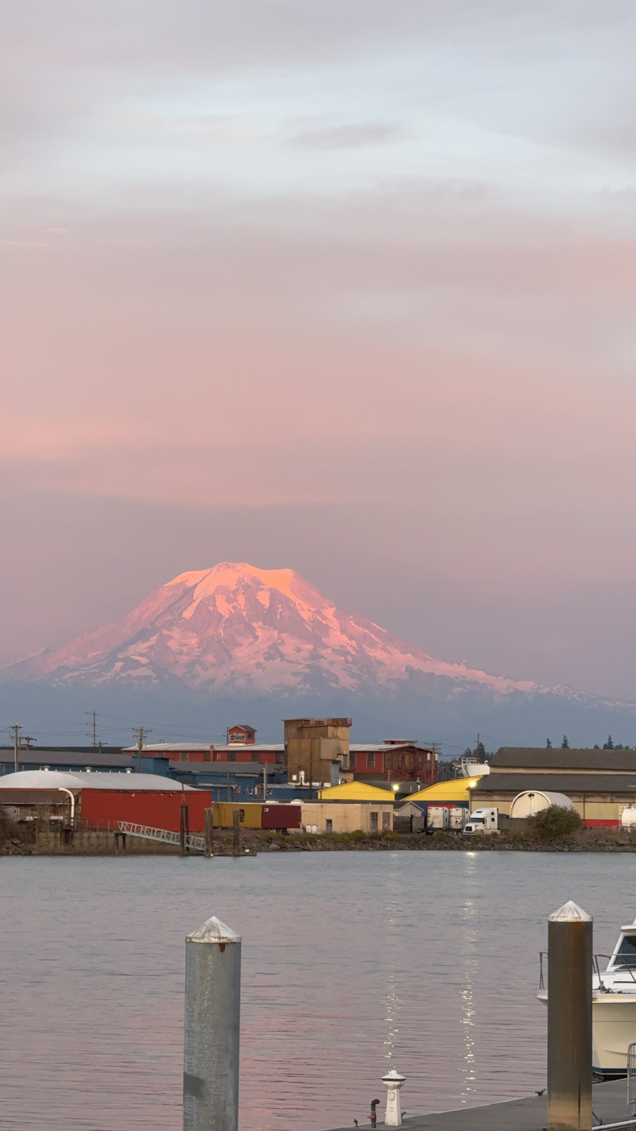 A soft pink sky over the mountains